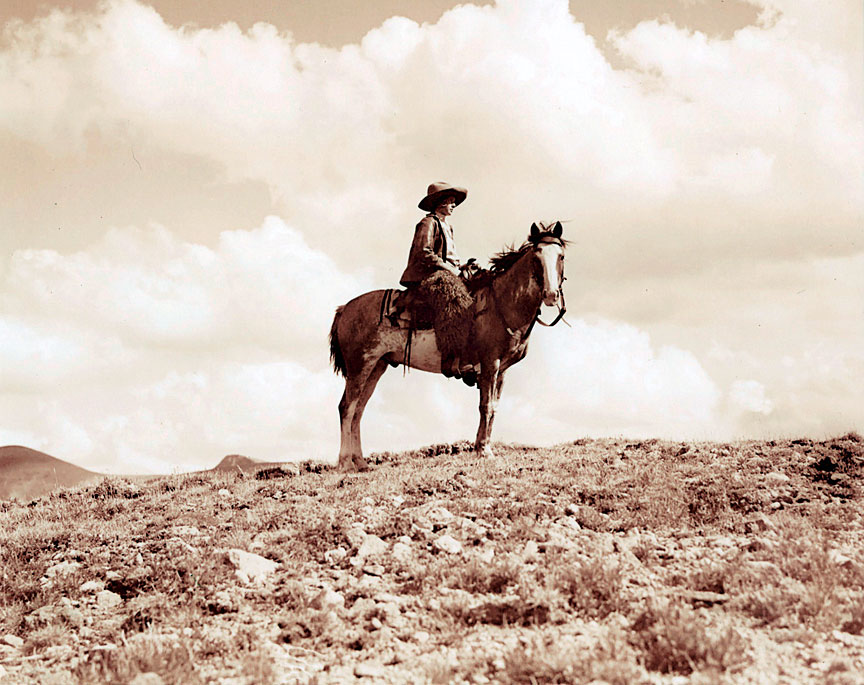 Cowgirl on the Ridge
